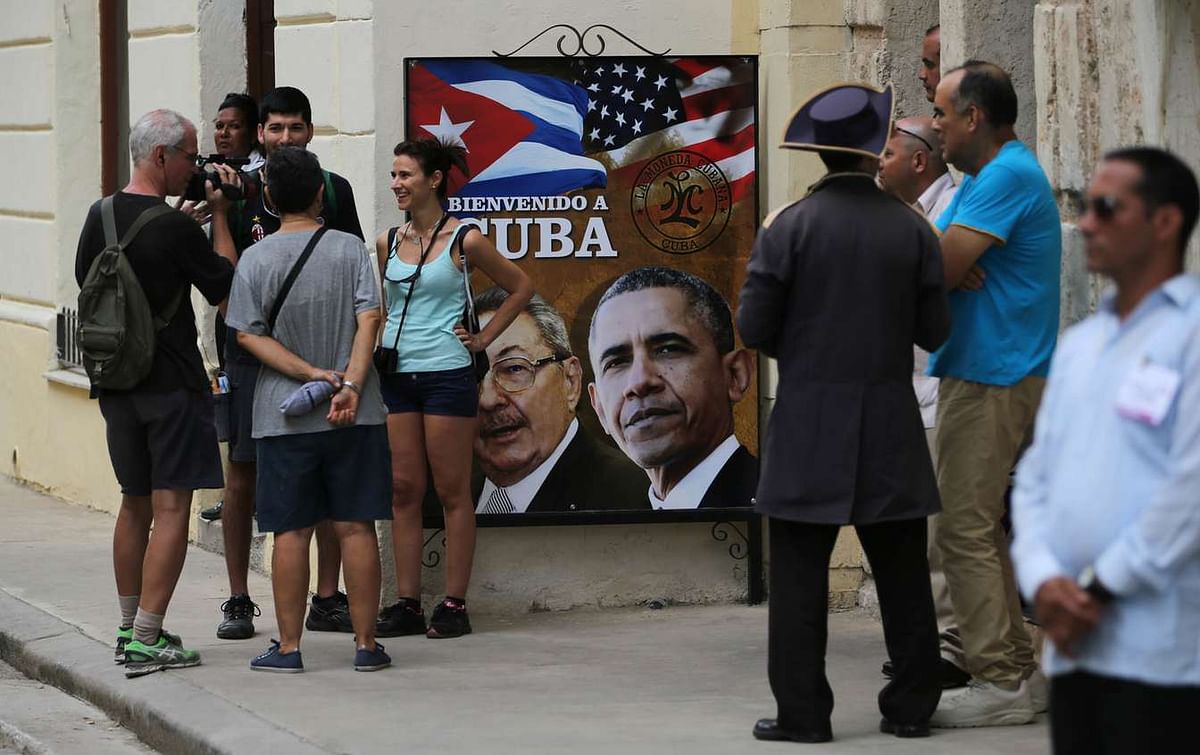 क्यूबा के सरकार विरोधी संगठन लगा रहे हैं ओबामा की यात्रा के विरोध में नारे. 