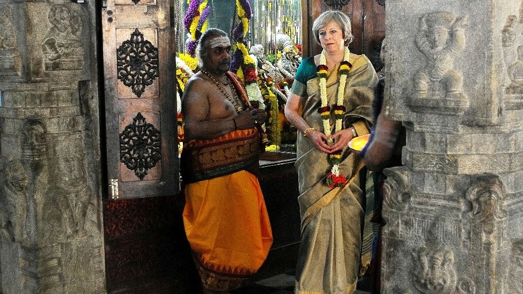 सितंबर 2016 में भारत दौरे के दौरान बेंगलुरू में ब्रिटिश पीएम थेरेसा मे. (फोटो: रॉयटर्स)