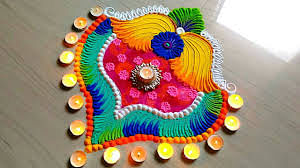 Diwali Rangoli Ideas: रंग-बिरंगी रंगोली और फूलों से घरों को सजाने का अपना महत्व है.