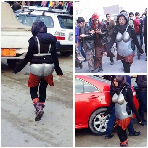 A woman walked solo around the streets of Kabul in a metallic harness, in a silent mark of protest. 