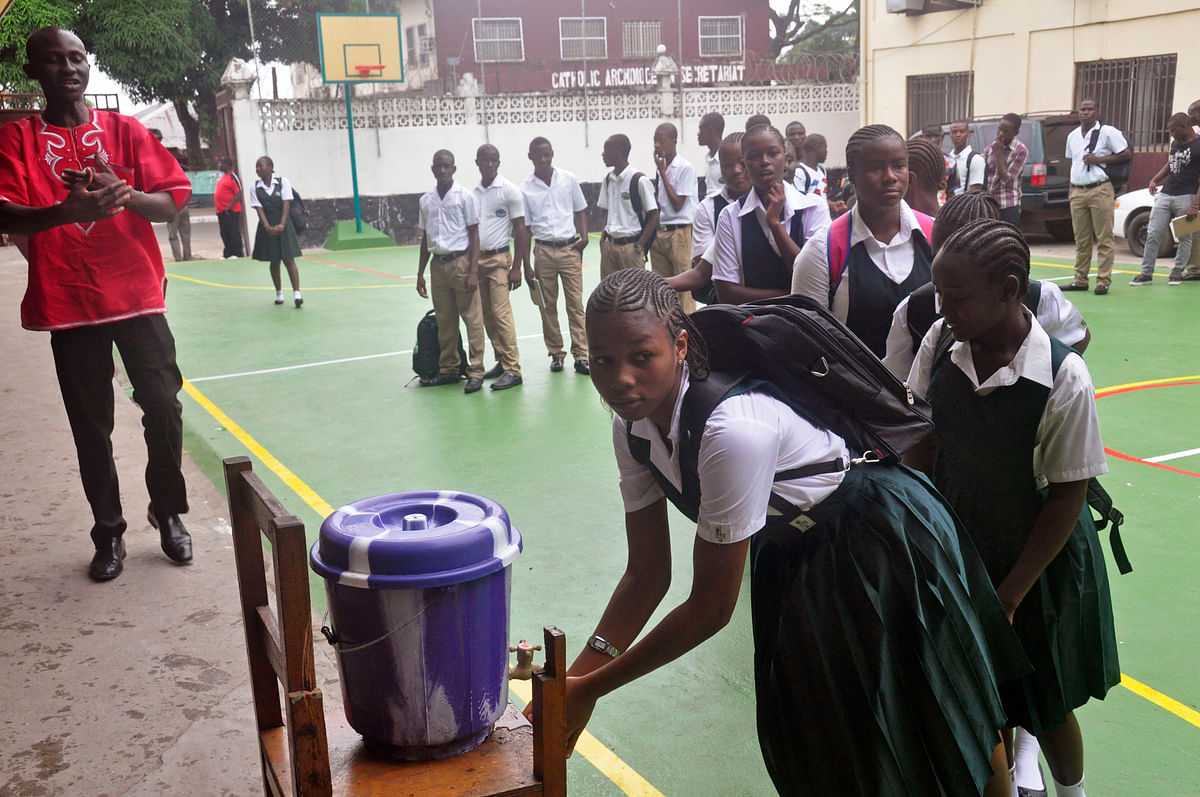 Students in Liberia return to school after six months as cases of Ebola fade 