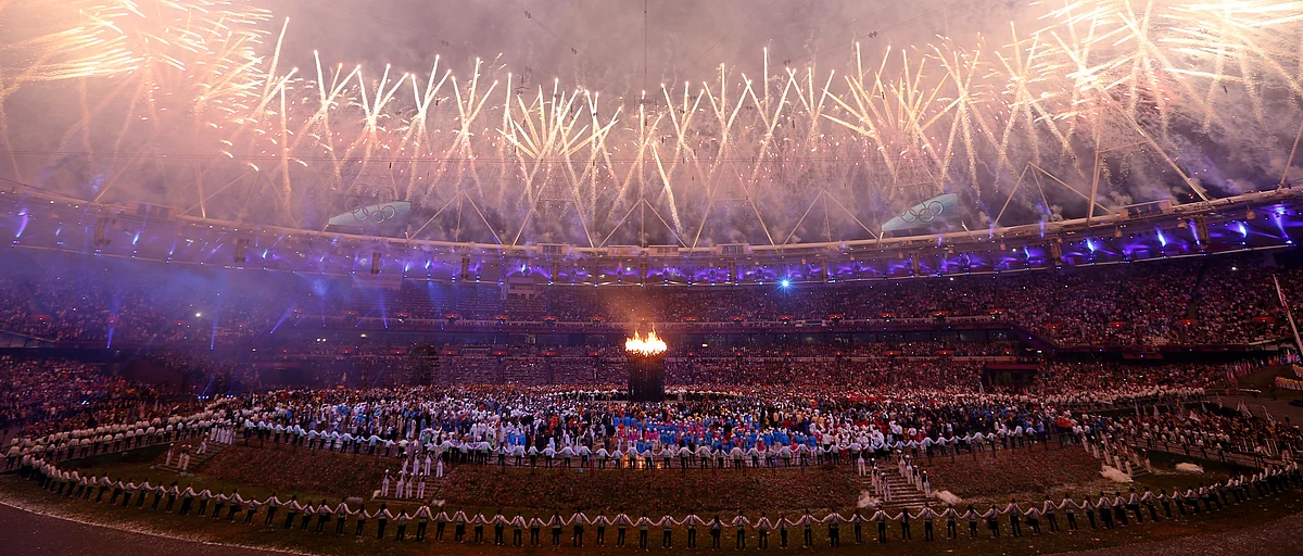 The Olympic cauldron is seen alight as fireworks explode during the opening ceremony of the London 2012 Olympic Games at the Olympic Stadium July 27, 2012. (Photo: Reuters)<!--EndFragment-->