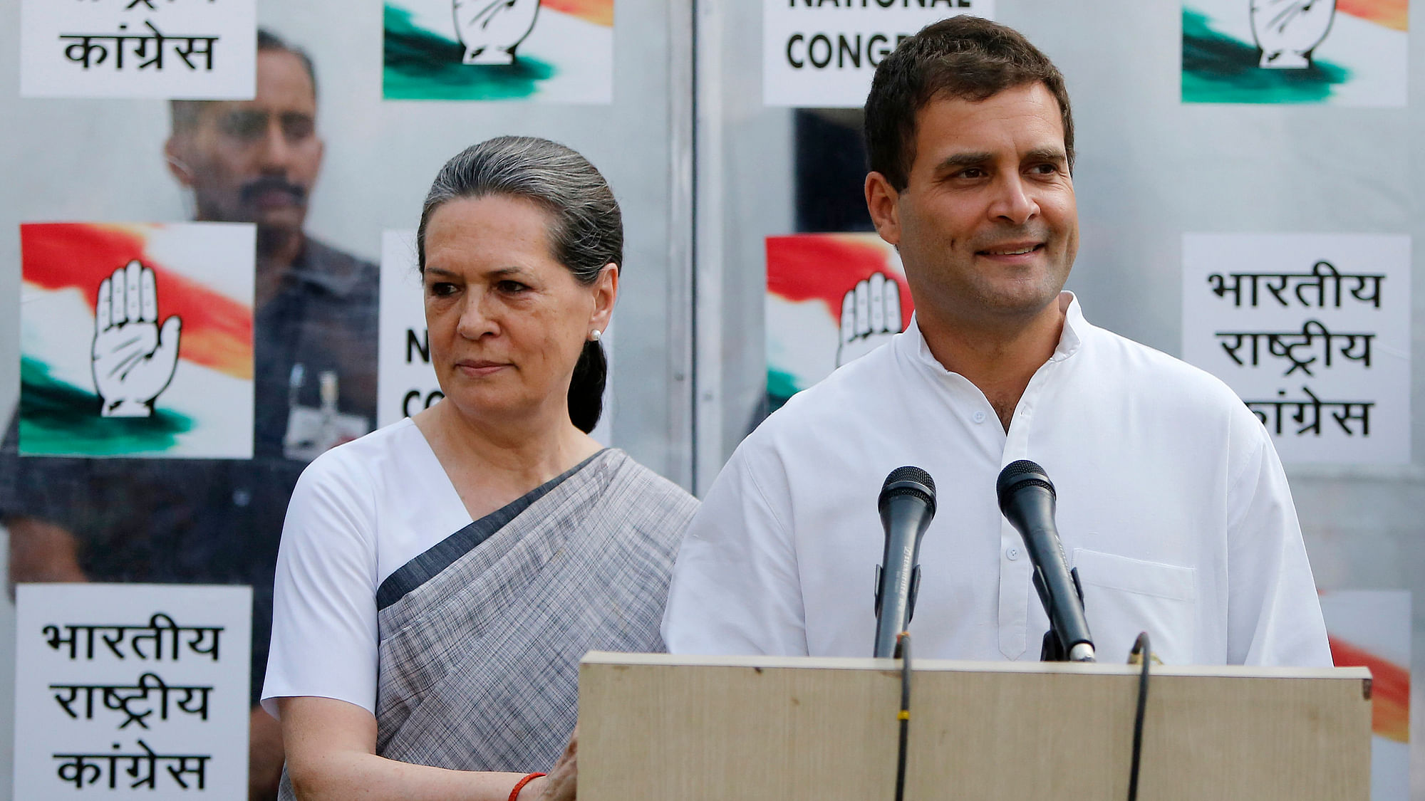Congress Vice-President Rahul Gandhi speaking to the media in New Delhi as his mother and Congress President Sonia Gandhi (L) stands next to him.&nbsp;
