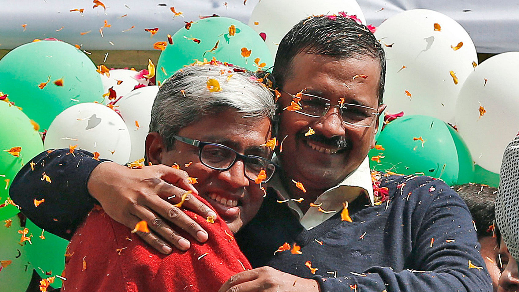 Ashutosh (L) with Arvind Kejriwal celebrating AAP’s victory in Delhi.&nbsp;