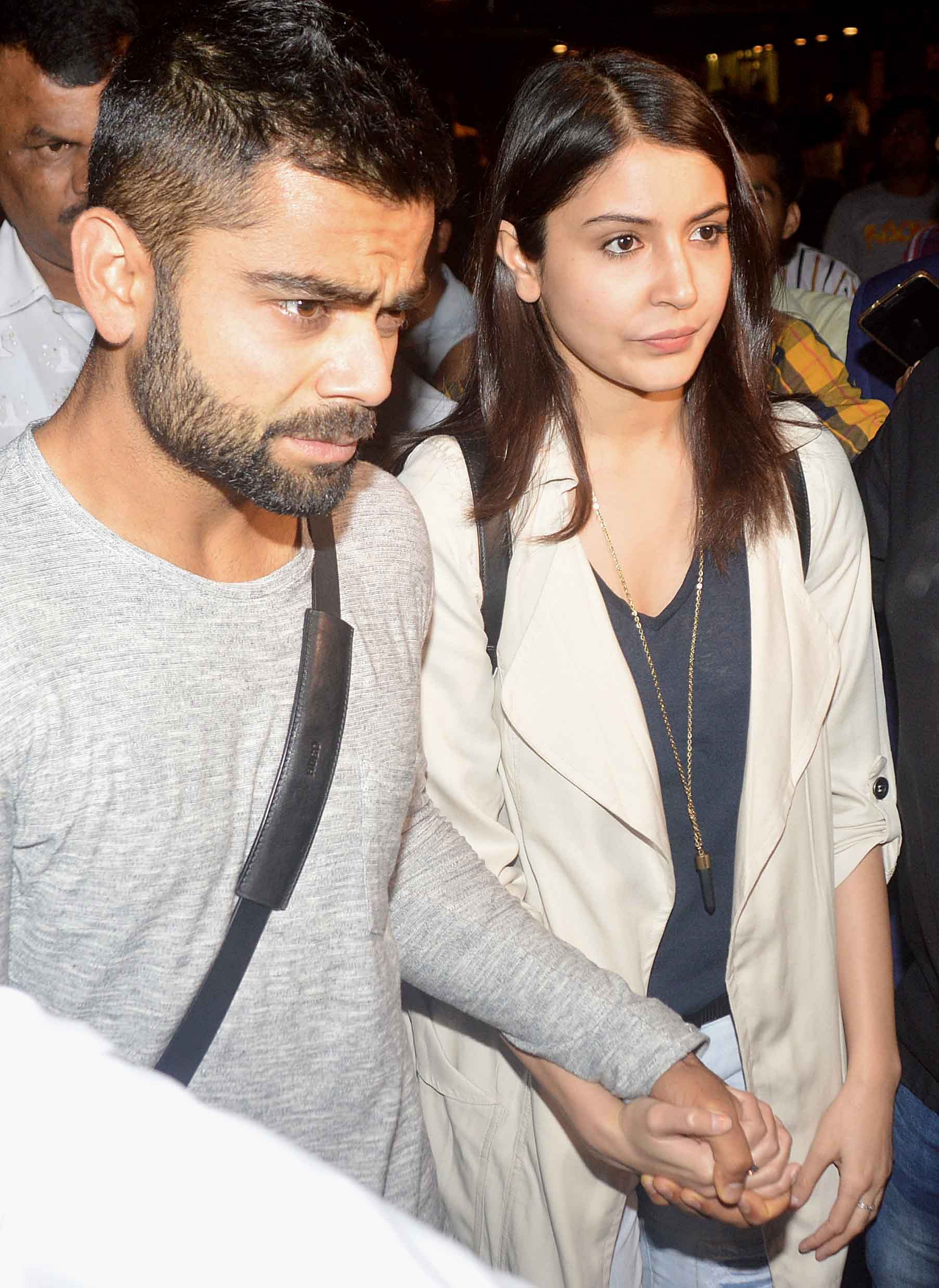 Though stressed, the couple looked adorable holding hands as they exited the Mumbai International Airport&nbsp;(Photo: Yogen Shah)