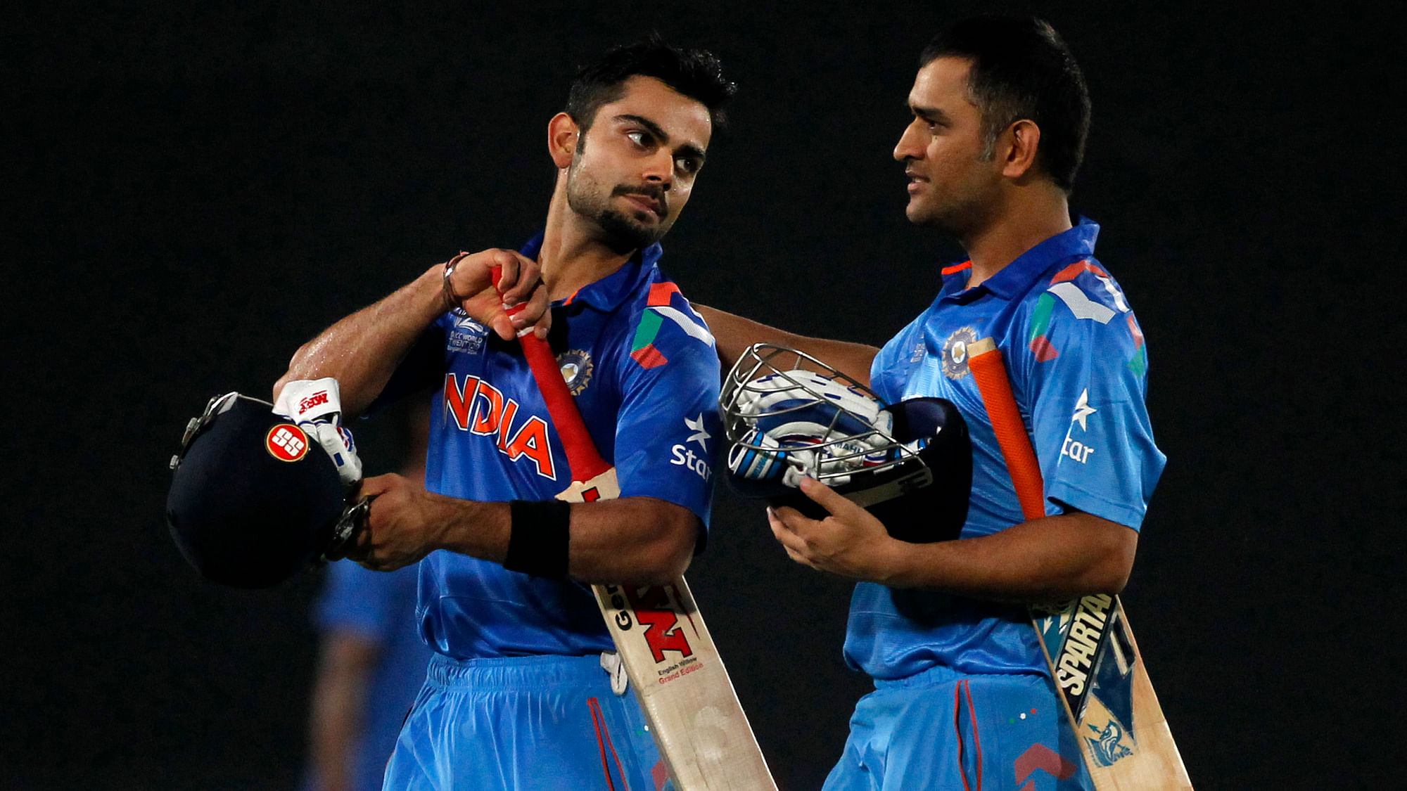 Virat Kohli and MS Dhoni during the ICC Twenty20 World Cup in 2014. (Photo: Reuters)