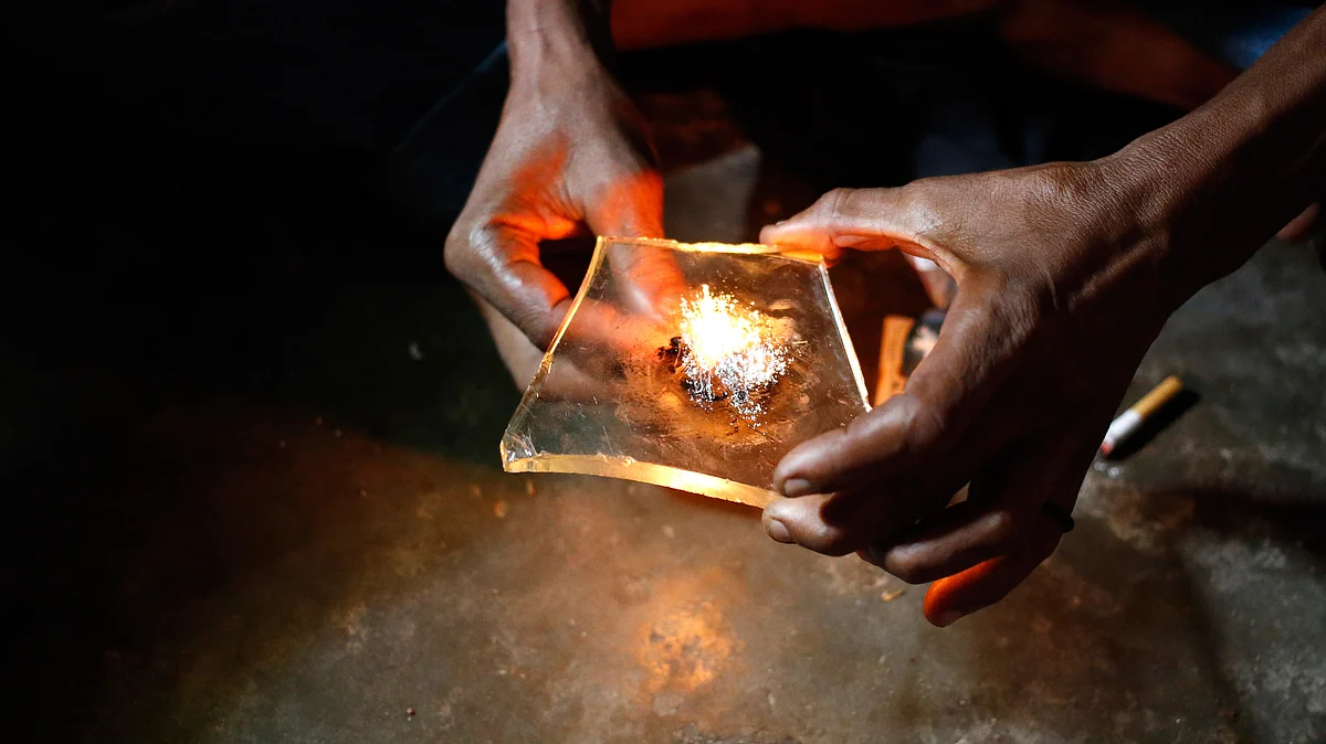A heroin addict prepares heroin before using it. (Photo: Reuters)