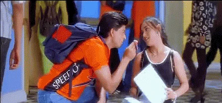 SRK gives Rani Mukerji a friendship band in the film <i>Kuch Kuch Hota Hai</i> (1998) (Source: <a href="https://www.youtube.com/watch?v=zpeTTEWUpP0">YouTube/Dharma Productions</a>)