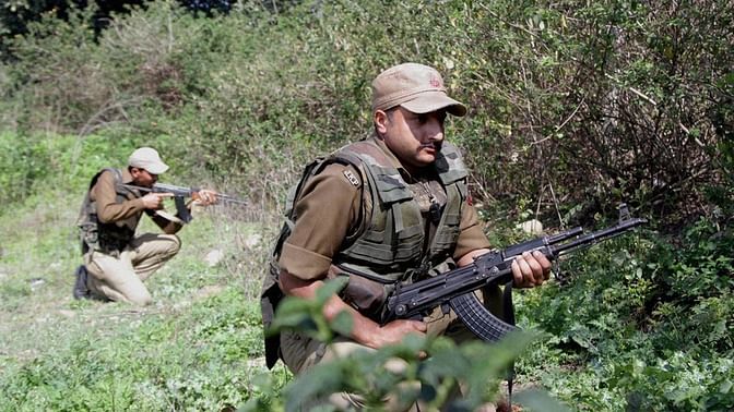 File photo of armed forces taking their positions during an encounter. (Photo: PTI)