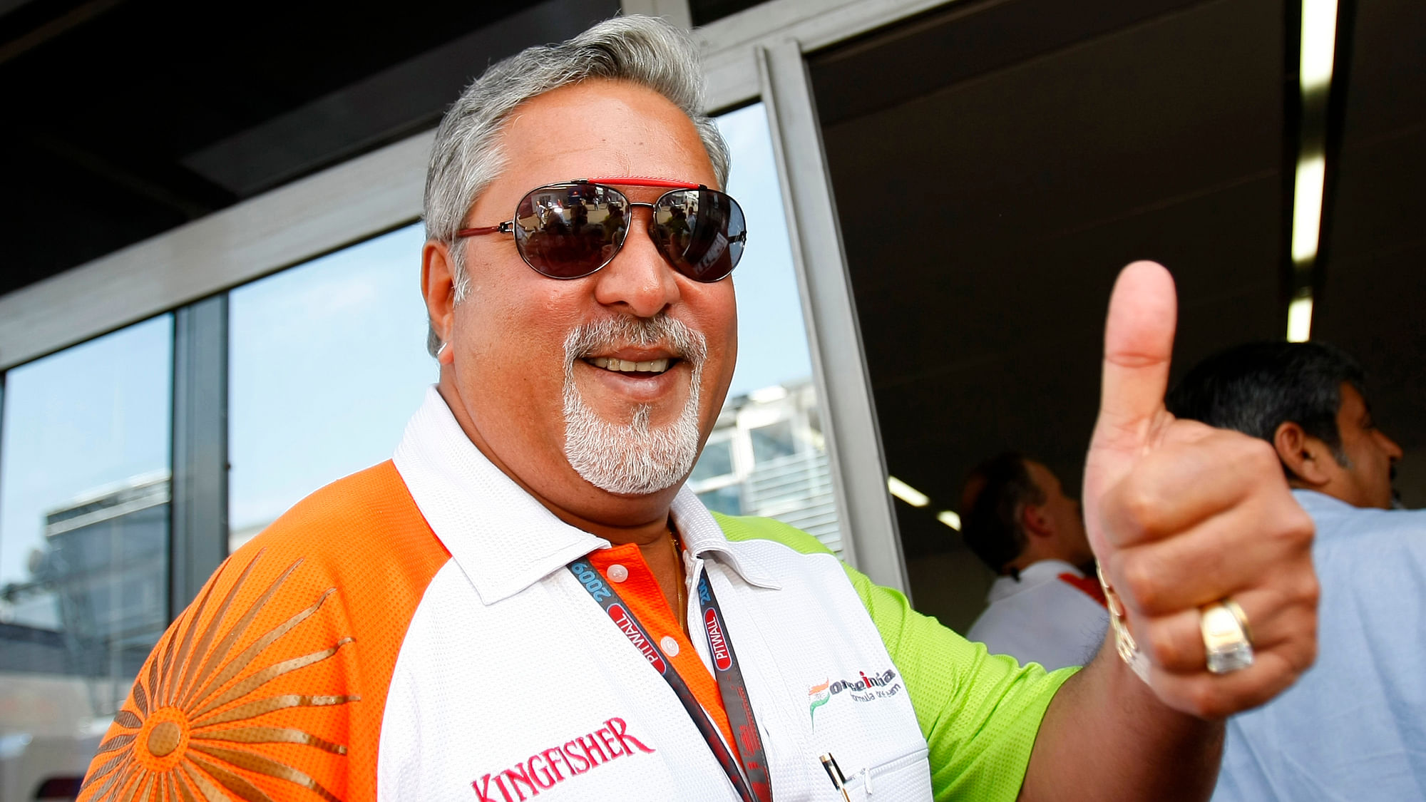 Force India team owner Vijay Mallya gives the thumbs up at the end of the third practice session of the Italian F1 Grand Prix in Monza, 12 September 2009. (Photo: Reuters)