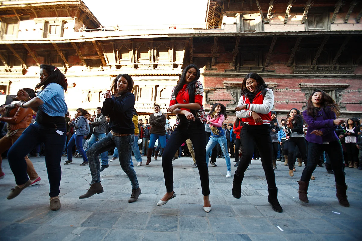 Students perform a Gangnam Style dance along the streets of Basantapur Durbar Square during an event. (Photo: Reuters)