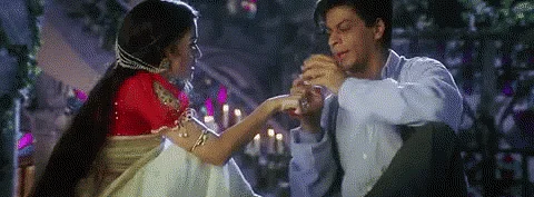 Devdas wooed Paro with a gold bangle on a moonlit night in <i>Devdas</i> (2002) (Source: <a href="https://www.youtube.com/watch?v=zzJE78-dlcA">YouTube/Eros Now</a>)