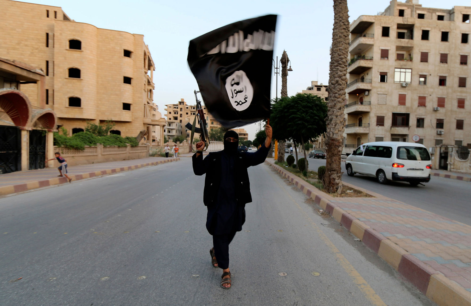 

<!--StartFragment-->A member loyal to the Islamic State in the Iraqi city of&nbsp;  Raqqa in 2014 (File Photo: Reuters)<!--EndFragment-->