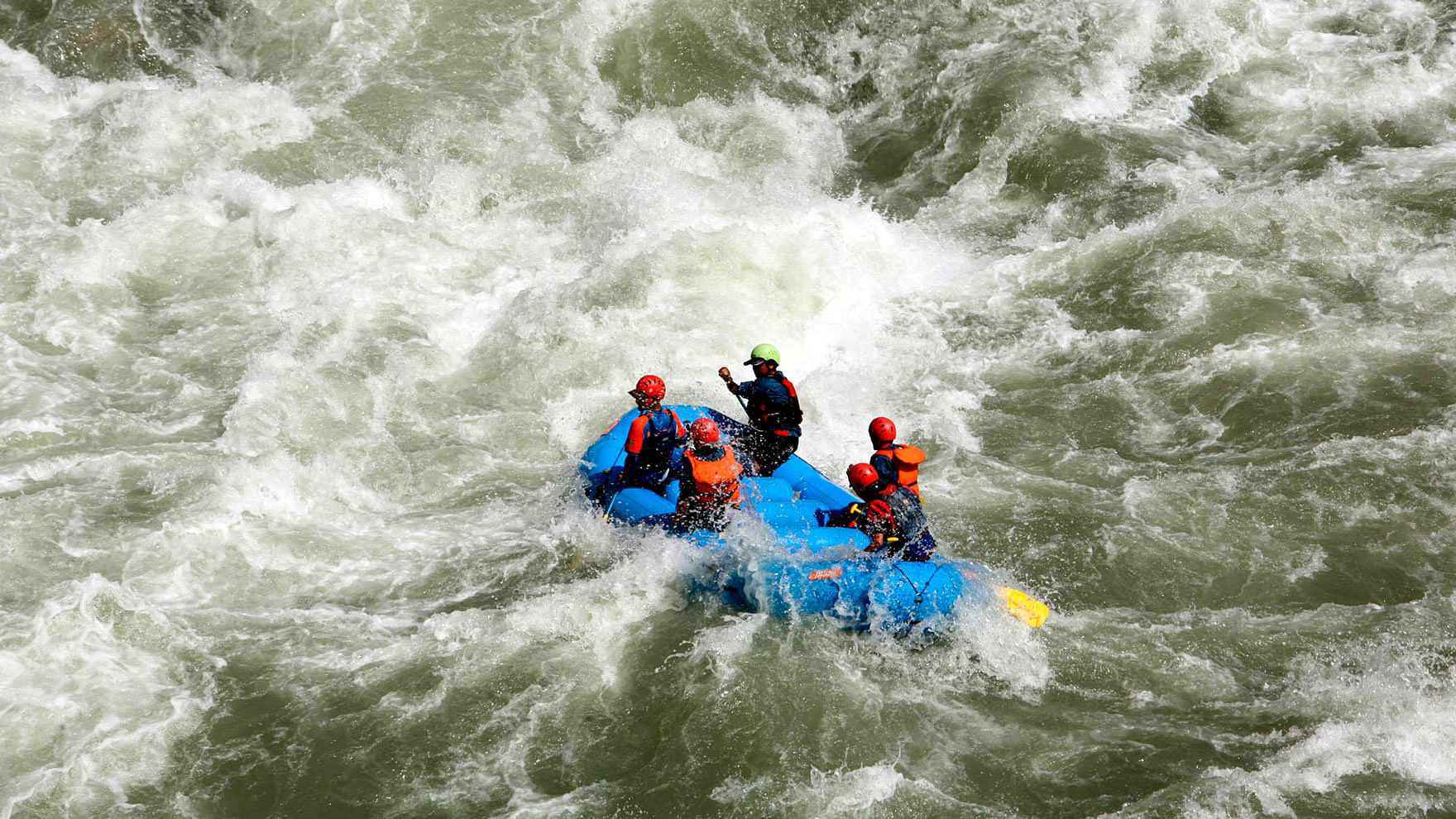  An image of people on a river raft used for representational purposes.