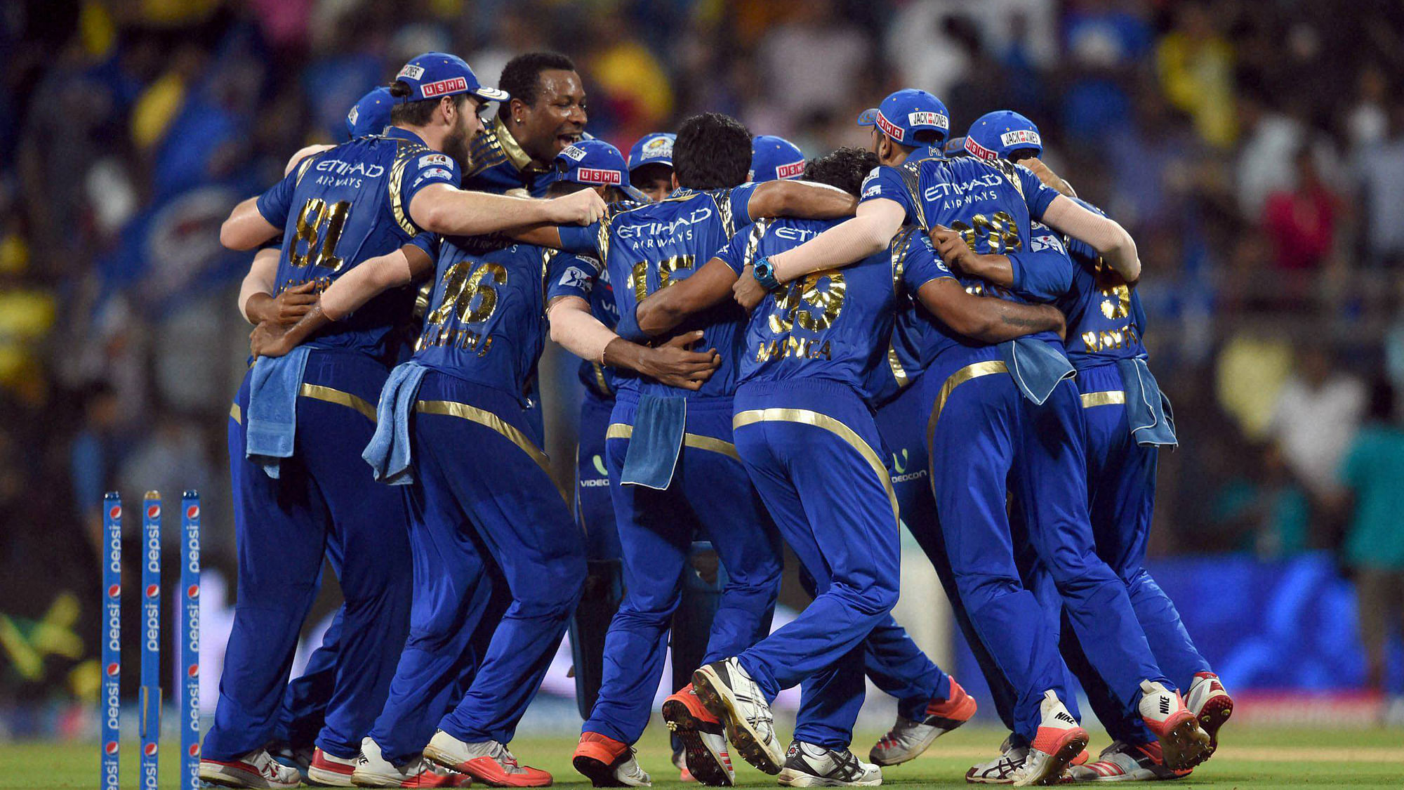 Mumbai Indians players celebrates the victory over Chennai Super Kings during the first qualifier match of IPL in Mumbai. (Photo: PTI)