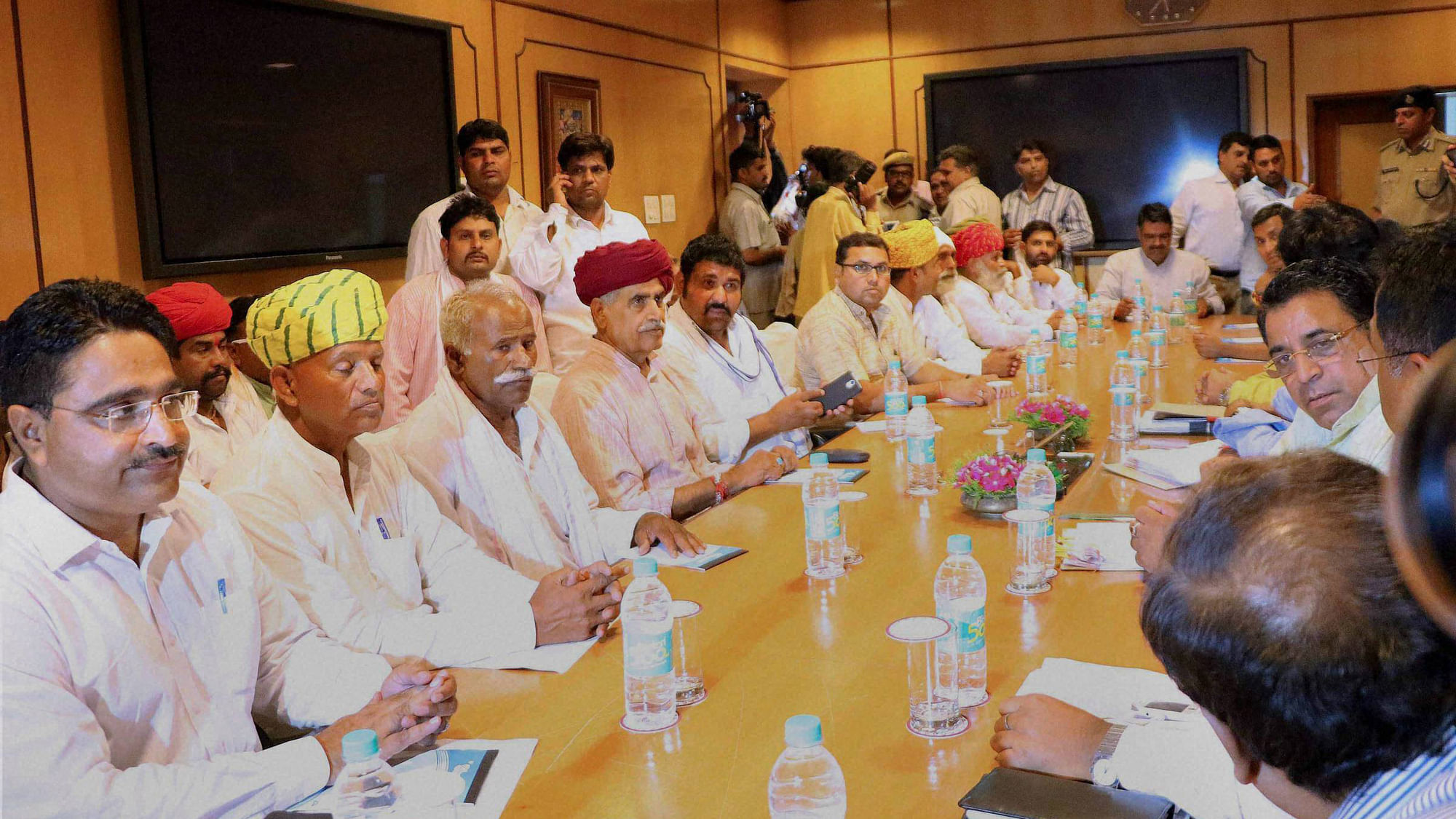  Gujjar community leader Kirori Singh Bainsla along with a delegation meeting with Rajasthan Cabinet Ministers. (Photo: PTI)