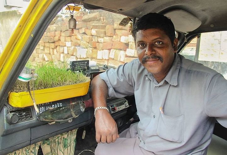 His Taxi has a roof top garden, trunk full of plants. Meet Dhananjay Chakraborty and his ‘subuj rath’. 
