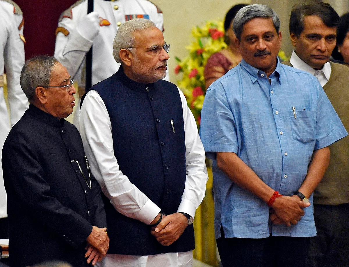 (From L to R) President Pranab Mukherjee, PM Narendra Modi, Defence Minister Manohar Parrikar, and Suresh Prabhu after the swearing-in ceremony at the presidential palace in November, 2014. (Photo: Reuters)