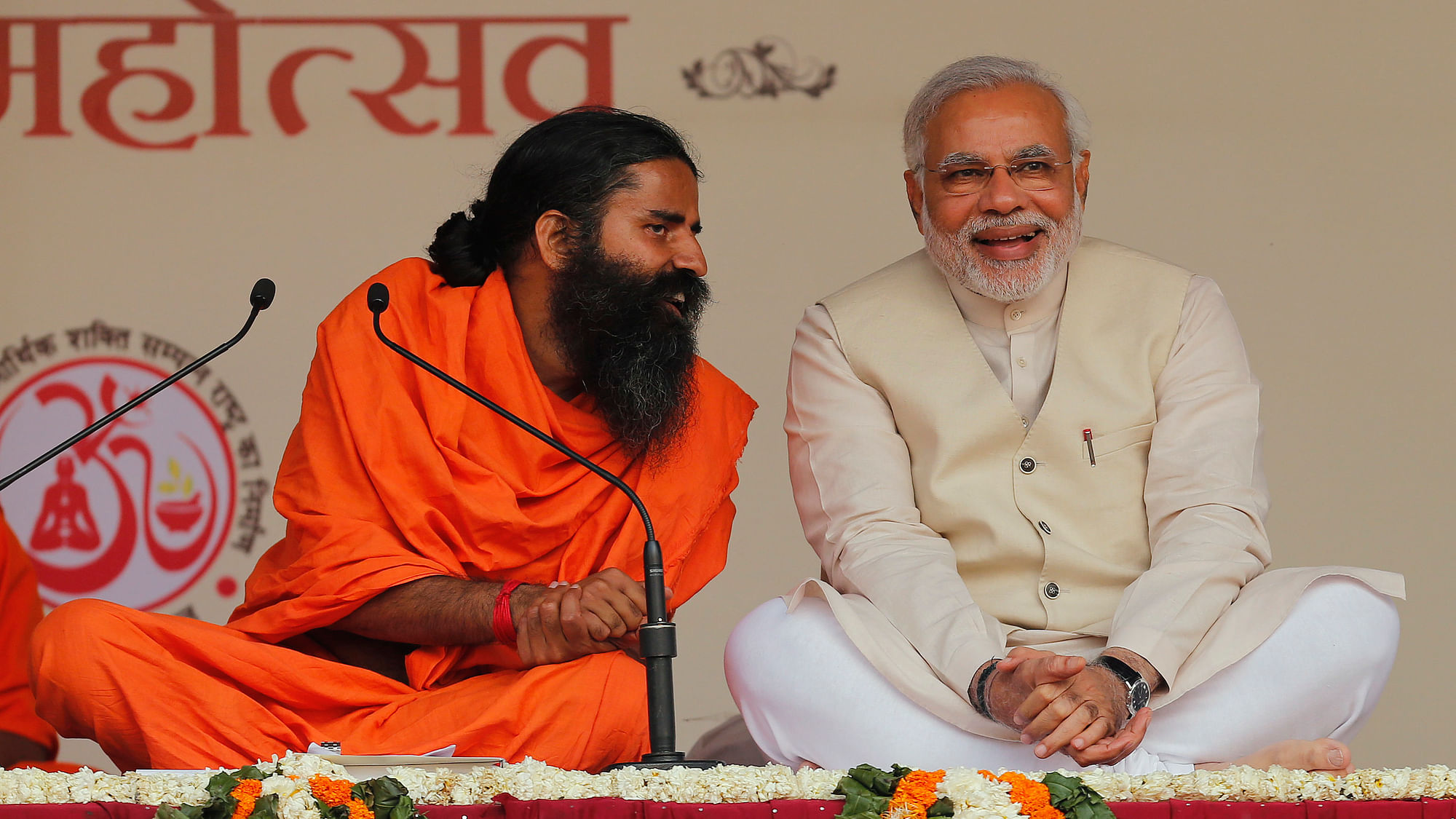 Yoga Guru Ramdev with PM Narendra Modi at a Yoga Festival. (Photo: Reuters)