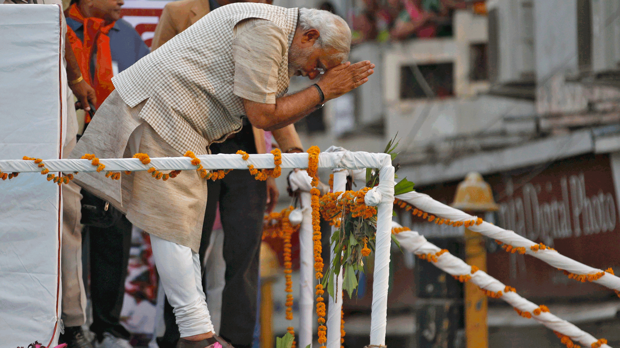 File picture:   Narendra Modi greets his supporters after addressing a public meeting in Vadodara on 16 May  2014 (Photo: Reuters)