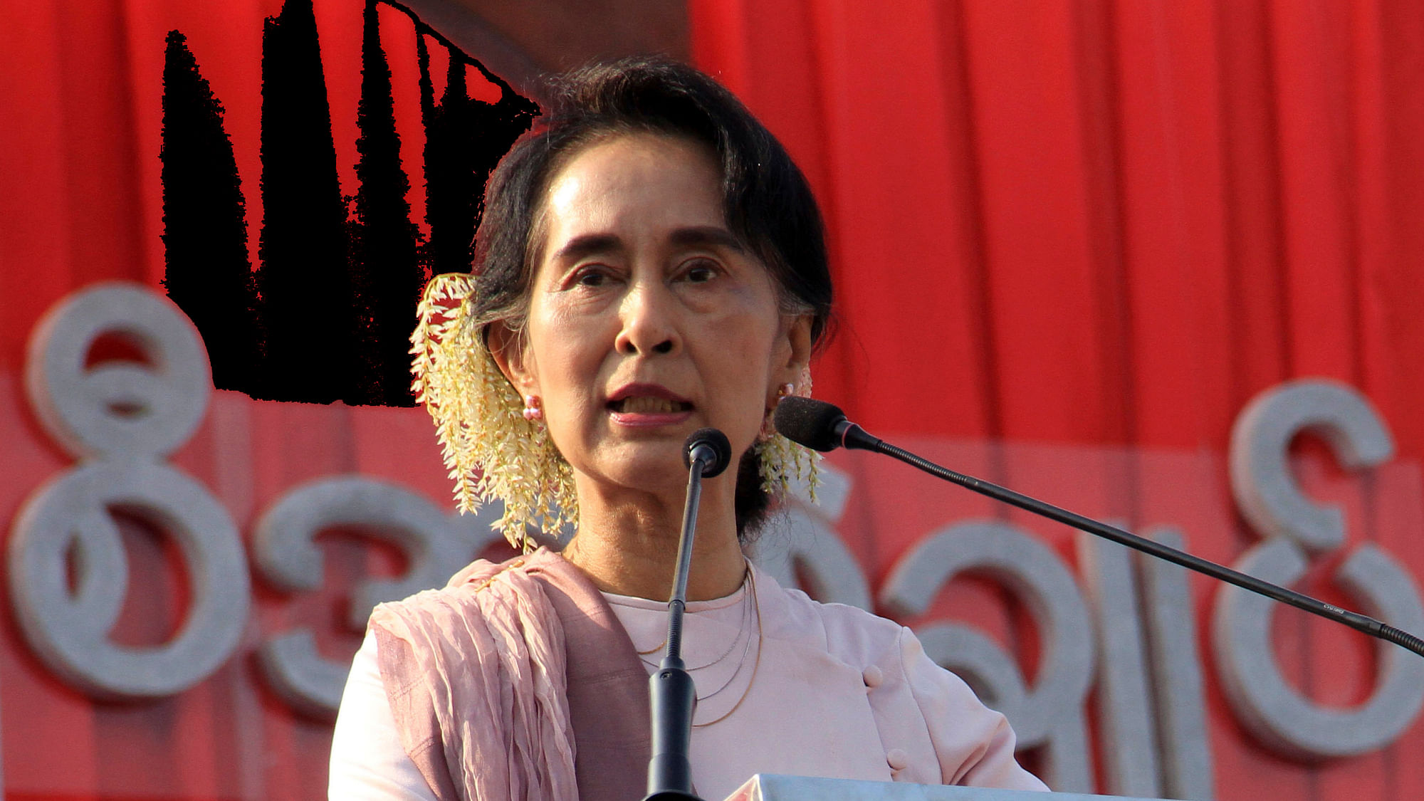 When fighting erupted in Rakhine, Aung San Suu Kyi had departed for a four-day visit to India.  (Photo: AP)