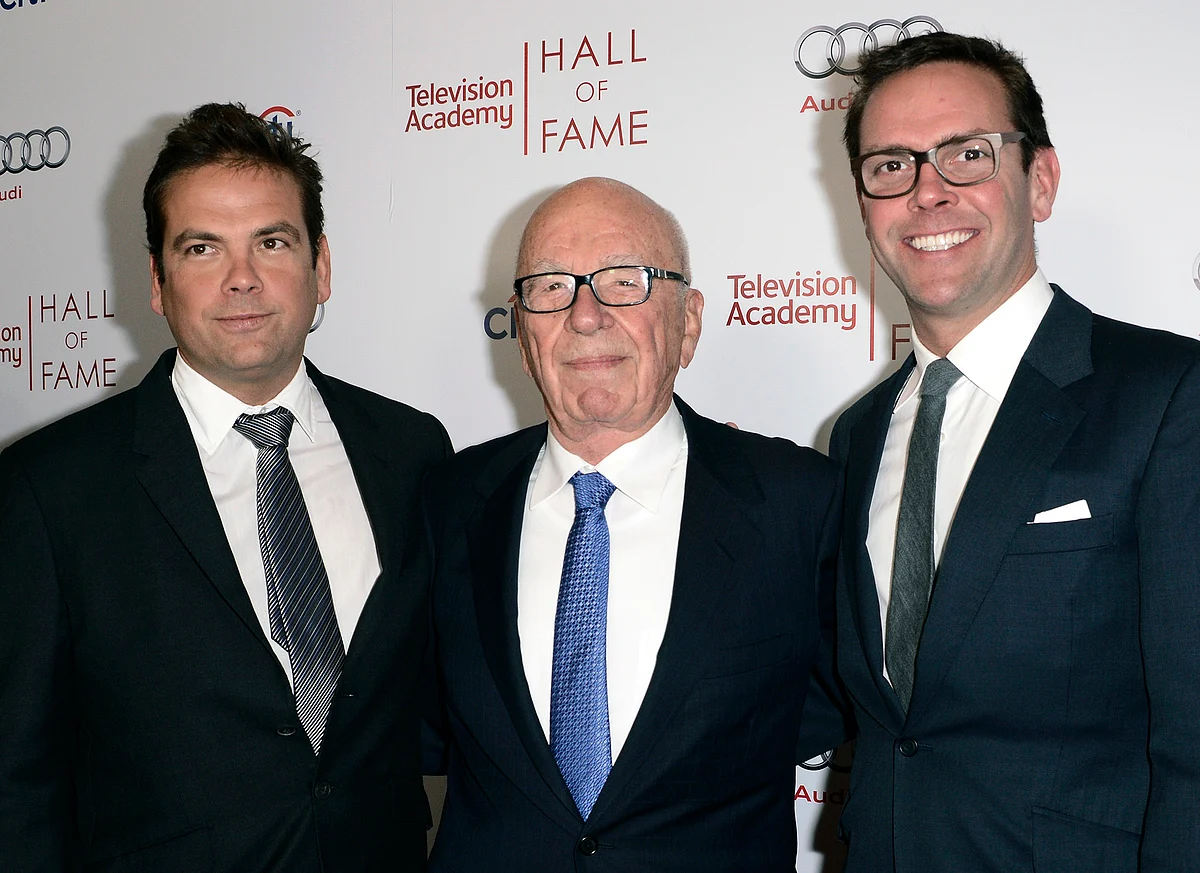 In this 11 March 2014 file photo, News Corp. Executive Chairman Rupert Murdoch (centre) and his sons, Lachlan (left) and James Murdoch attend the 2014 Television Academy Hall of Fame in Beverly Hills, California.