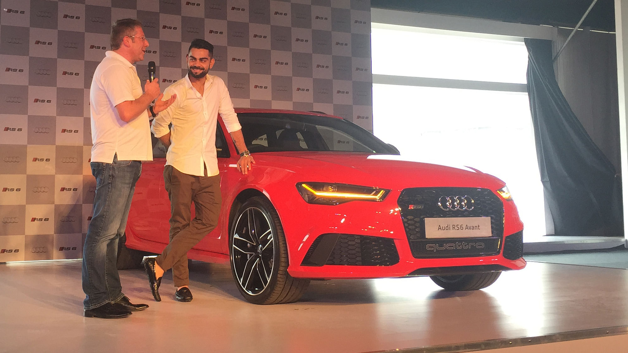 (Left)&nbsp;Joe King, Head, Audi India with Ace Cricketer Virat Kohli at the launch of Audi RS 6 Avant in India. (Photo: The Quint)