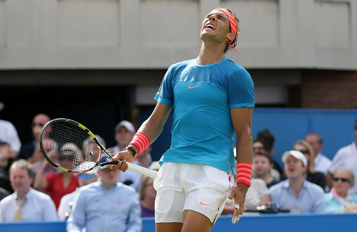 Rafael Nadal reacts after missing a shot in his Queen’s opener. (Photo: AP)