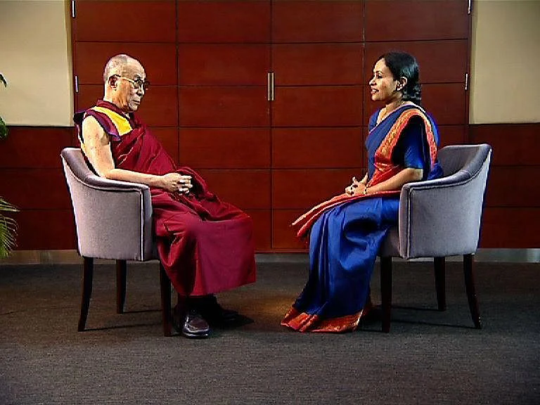 Veena George interviewing his holiness Dalai Lama. (Photo Courtesy: <i>The News Minute</i>)