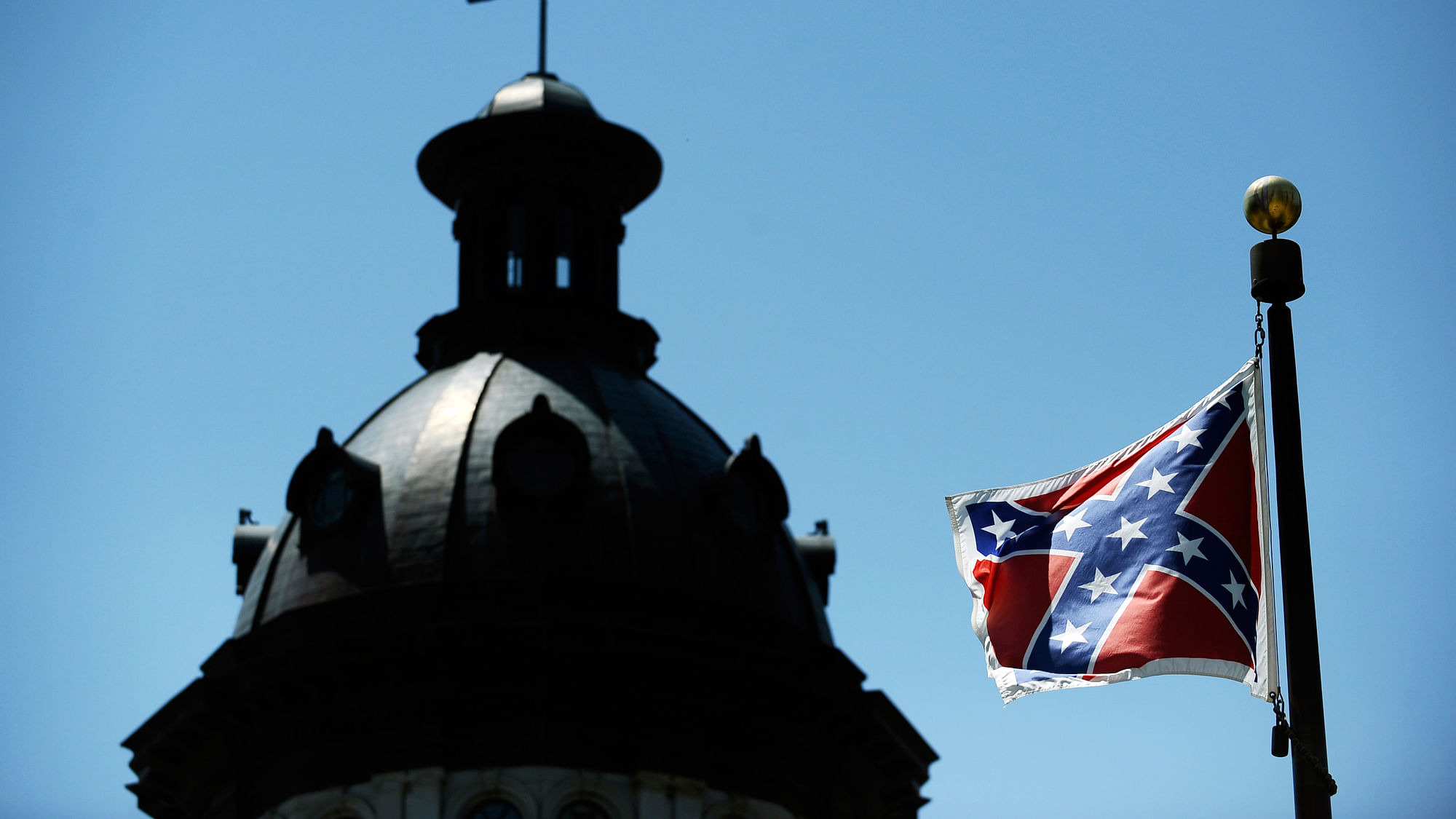 The Confederate flag flies near the South Carolina Statehouse, in Columbia. (Photo: AP/Rainier Ehrhardt)