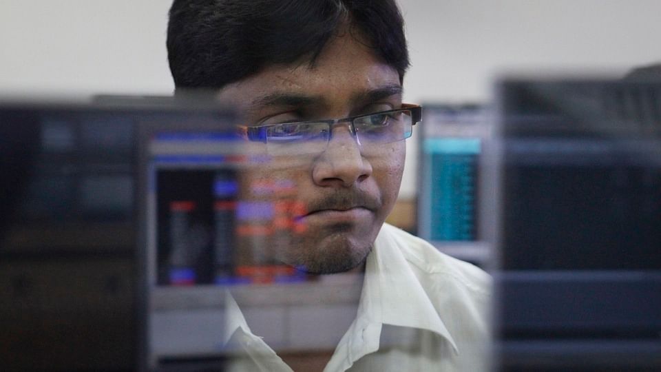 Sensex falls by 85 points, Nifty slips by 35 points.