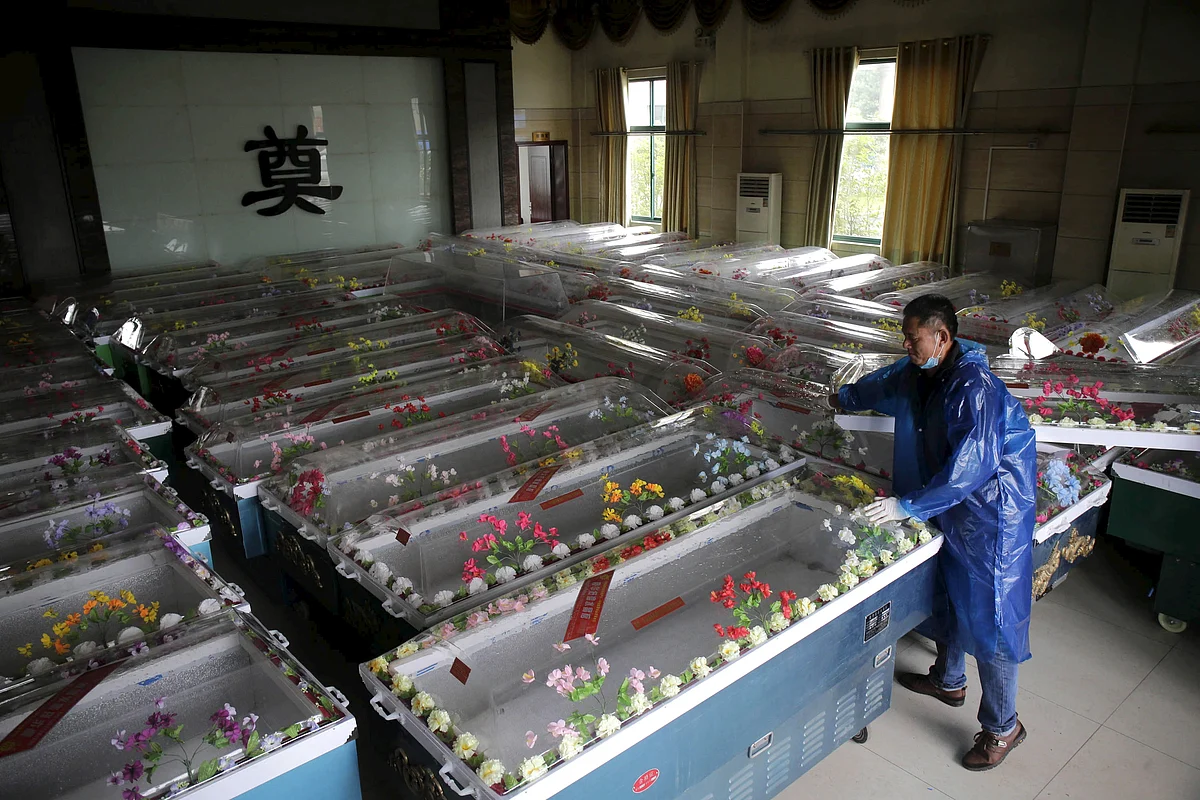 A mortuary worker prepares coffins in Jianli, Hubei province, after a cruise ship sank on the Yangtze River, in what could be China’s worst shipping disaster in almost 70 years. (Photo: Reuters)