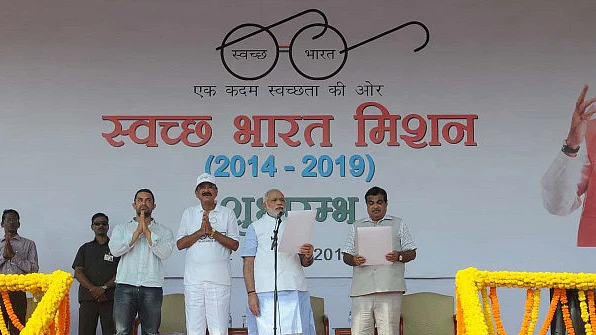 Prime Minister Narendra Modi (centre) at the launch of the Swacch Bharat (Clean India) Mission in New Delhi on October 2, 2014. (Photo: PIB)