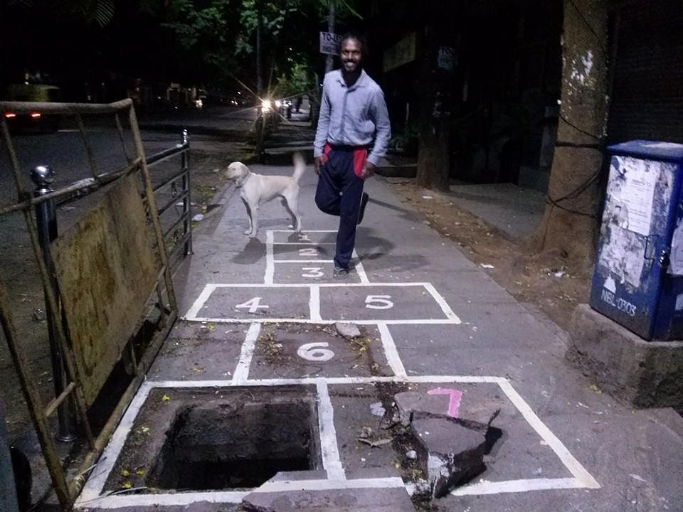 After turning potholes into ‘rakshasas’, Bengaluru artist brings a crocodile to the city’s roads. 