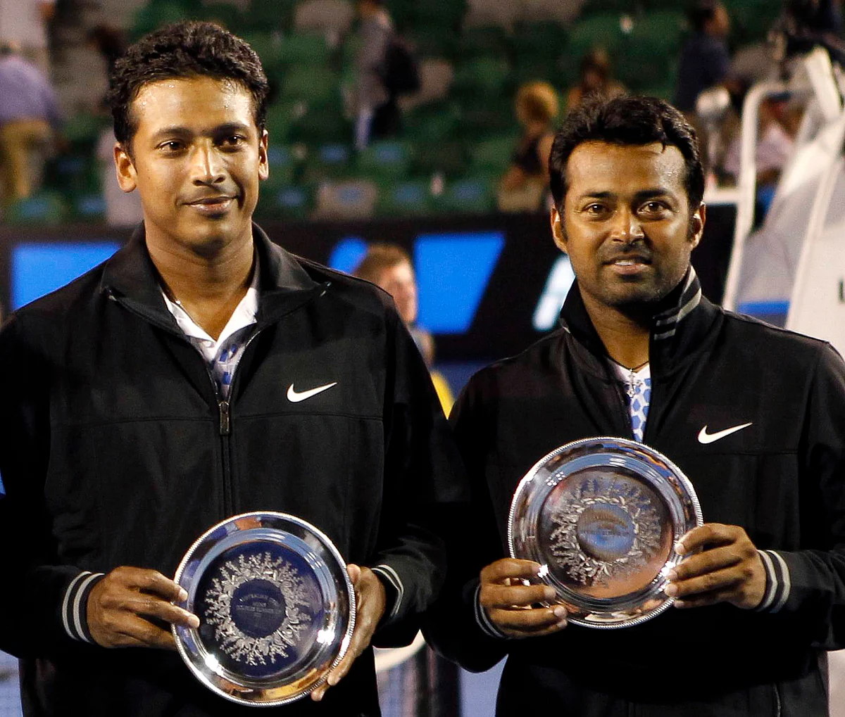 Mahesh Bhupathi and Leander Paes (R) of India pose with their trophies after their men’s doubles final match against Bob Bryan and Mike Bryan of the U.S. at the Australian Open tennis tournament in Melbourne. (Photo: Reuters)