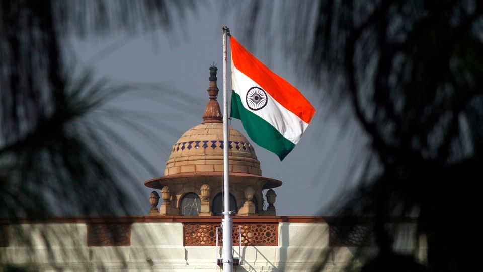 The Indian tricolour flutters on top of the Indian parliament building in New Delhi. (Photo: Reuters)