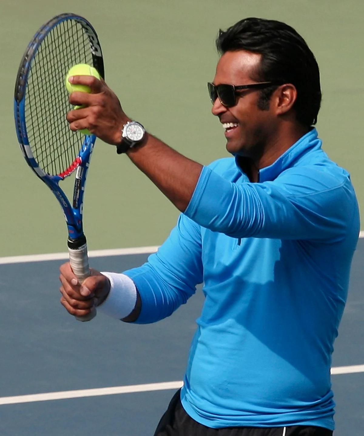 Leander Paes laughs during an interaction with budding tennis players at the Delhi Lawn Tennis Association (DLTA) stadium in New Delhi. (Photo: Reuters)