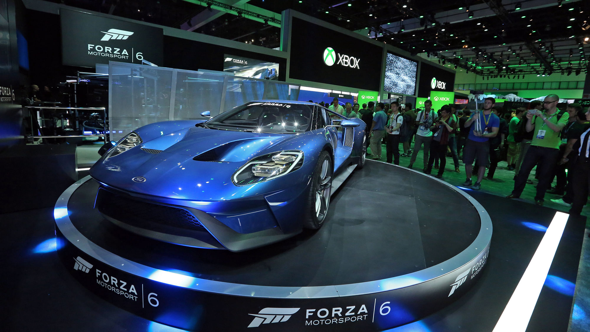 People check out the all new 2017 Ford GT alongside Forza Motorsport 6 at the Xbox booth at E3 in Los Angeles on Tuesday (Photo: AP)