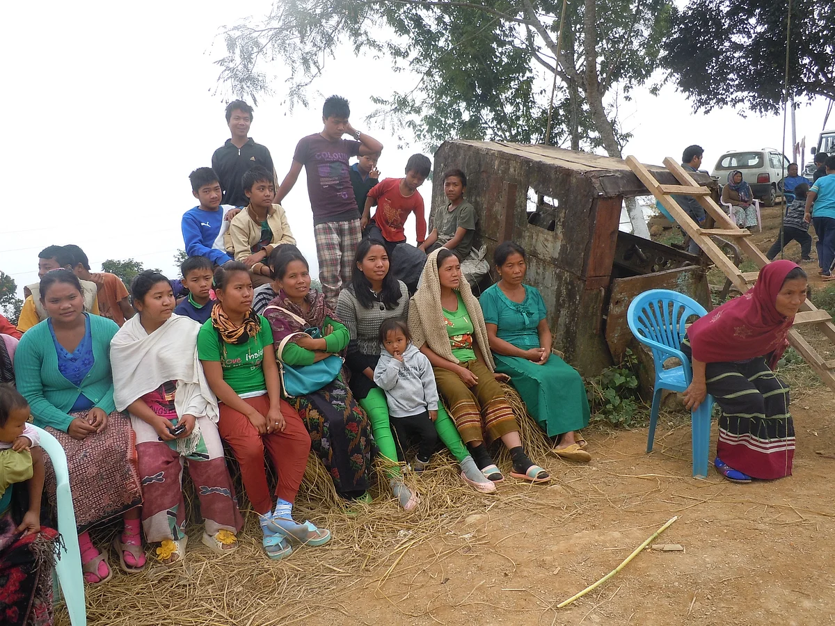 <!--EndFragment-->Women attending a village meeting in Paraolon. (Photo: Maitreyee Handique)