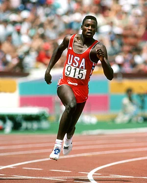 Legendary Olympian Carl Lewis in action . (Photo Courtesy:<a href="http://yunga-youth.weebly.com/carl-lewis.html"> Youth & United Nations</a>)