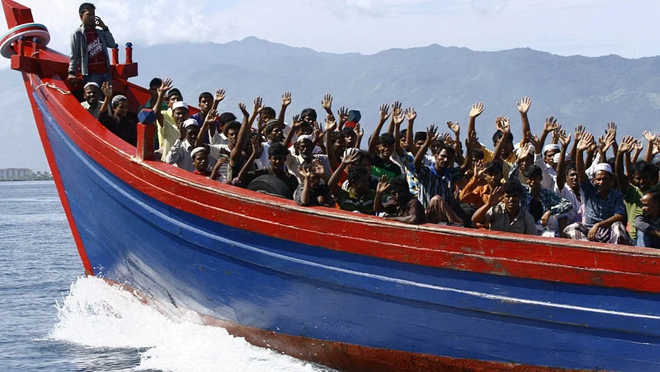 Rohingya refugees being transported to a temporary shelter. 