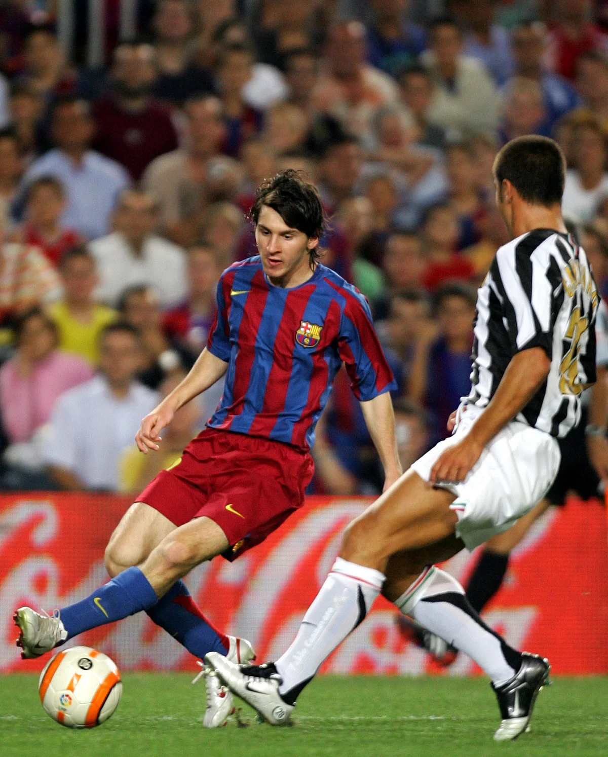 Barcelona’s Leo Messi (L) of Argentina with Juventus’ Fabio Cannavaro during a friendly soccer match for the Joan Gamper Trophy in Barcelona, Spain August 24, 2005. (Photo: Reuters)