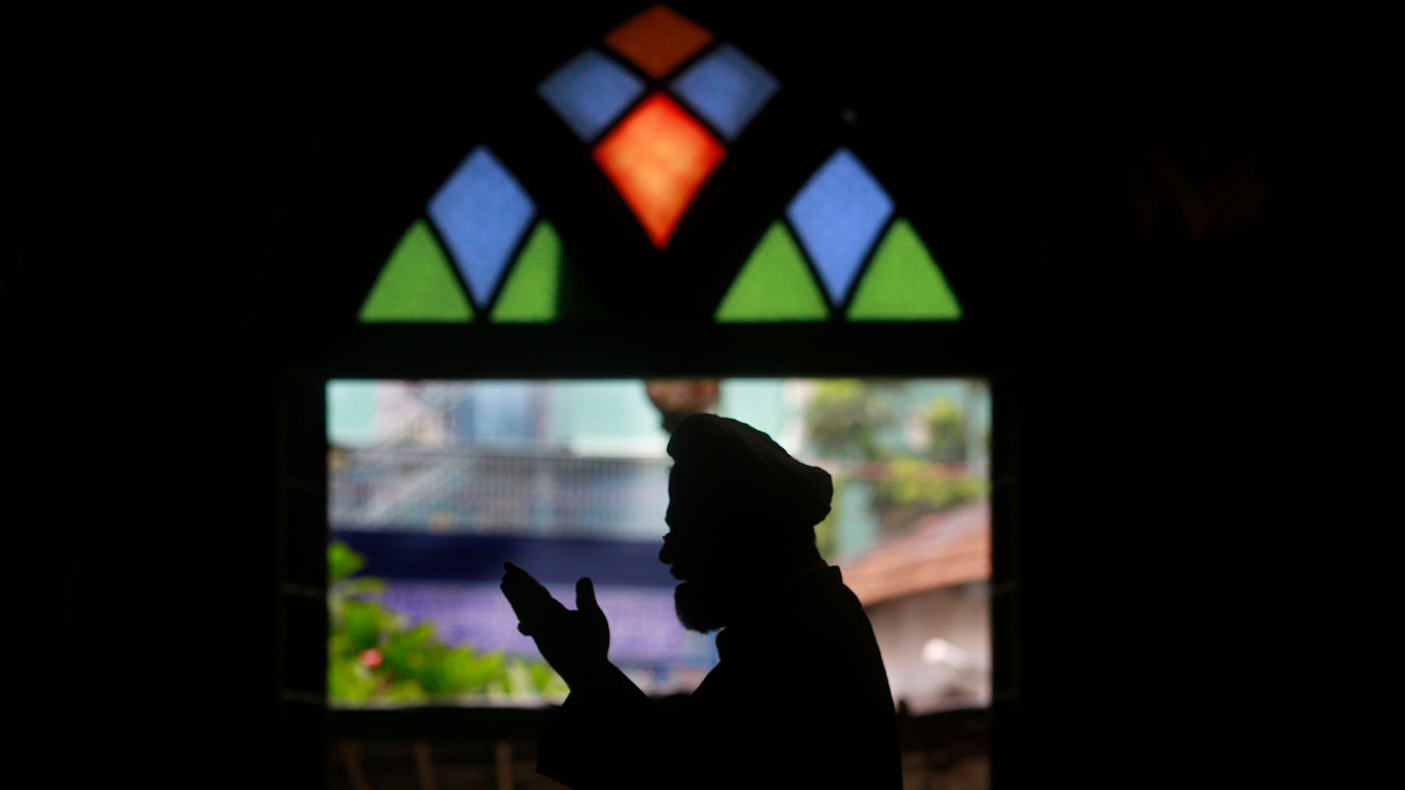 A Shia Muslim offers afternoon Ramadan prayers at a mosque in Mumbai. 