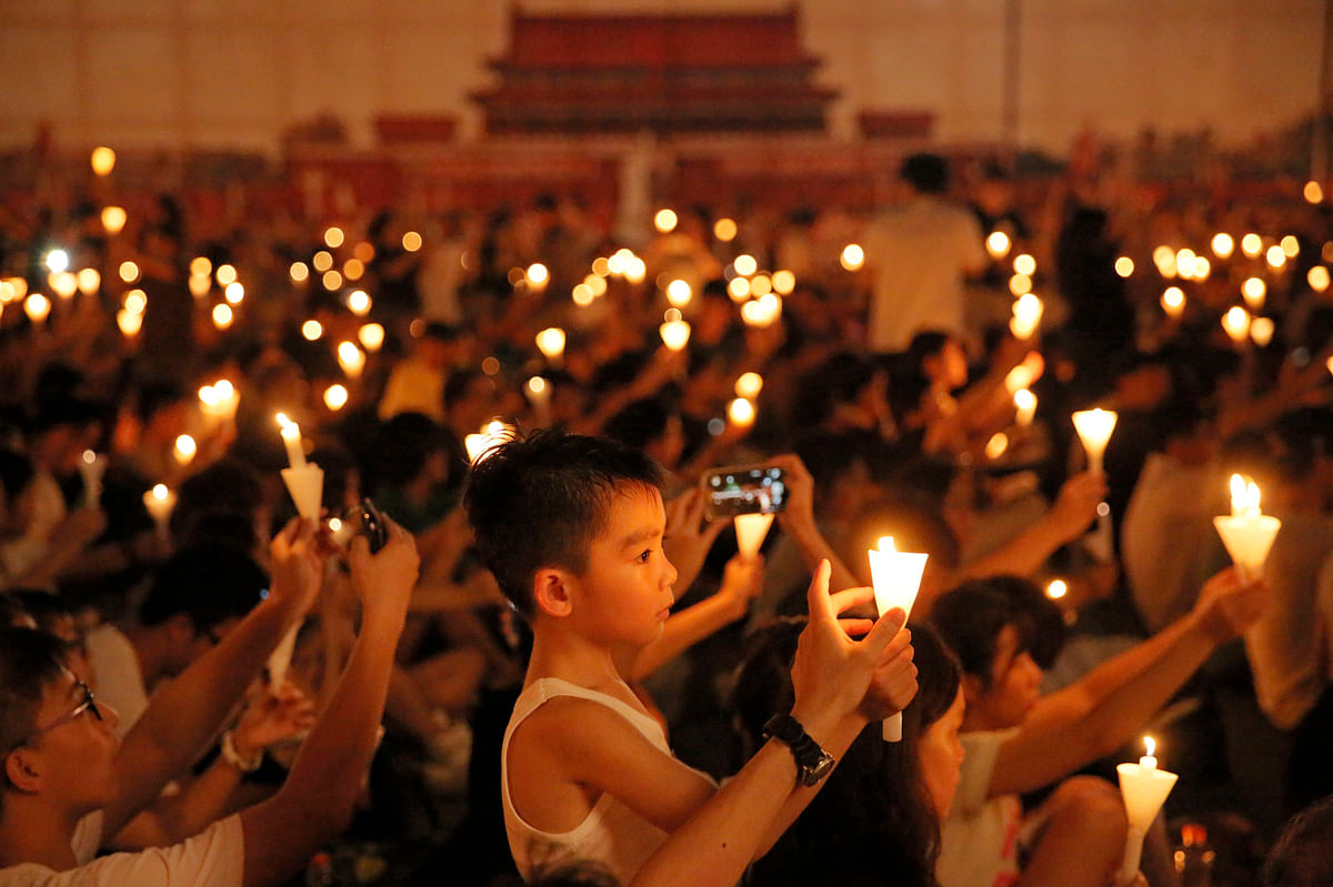 Tens of thousands in Hong Kong remember the Tiananmen Square protests through several candle light vigils.