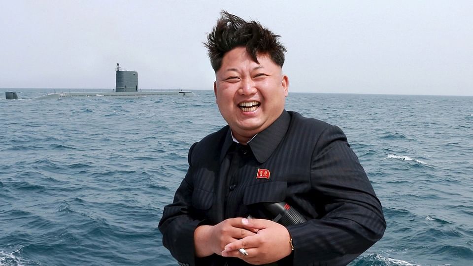 North Korean leader Kim Jong-un watches the test-fire of a strategic submarine underwater ballistic missile (not pictured).  (Photo: Reuters)