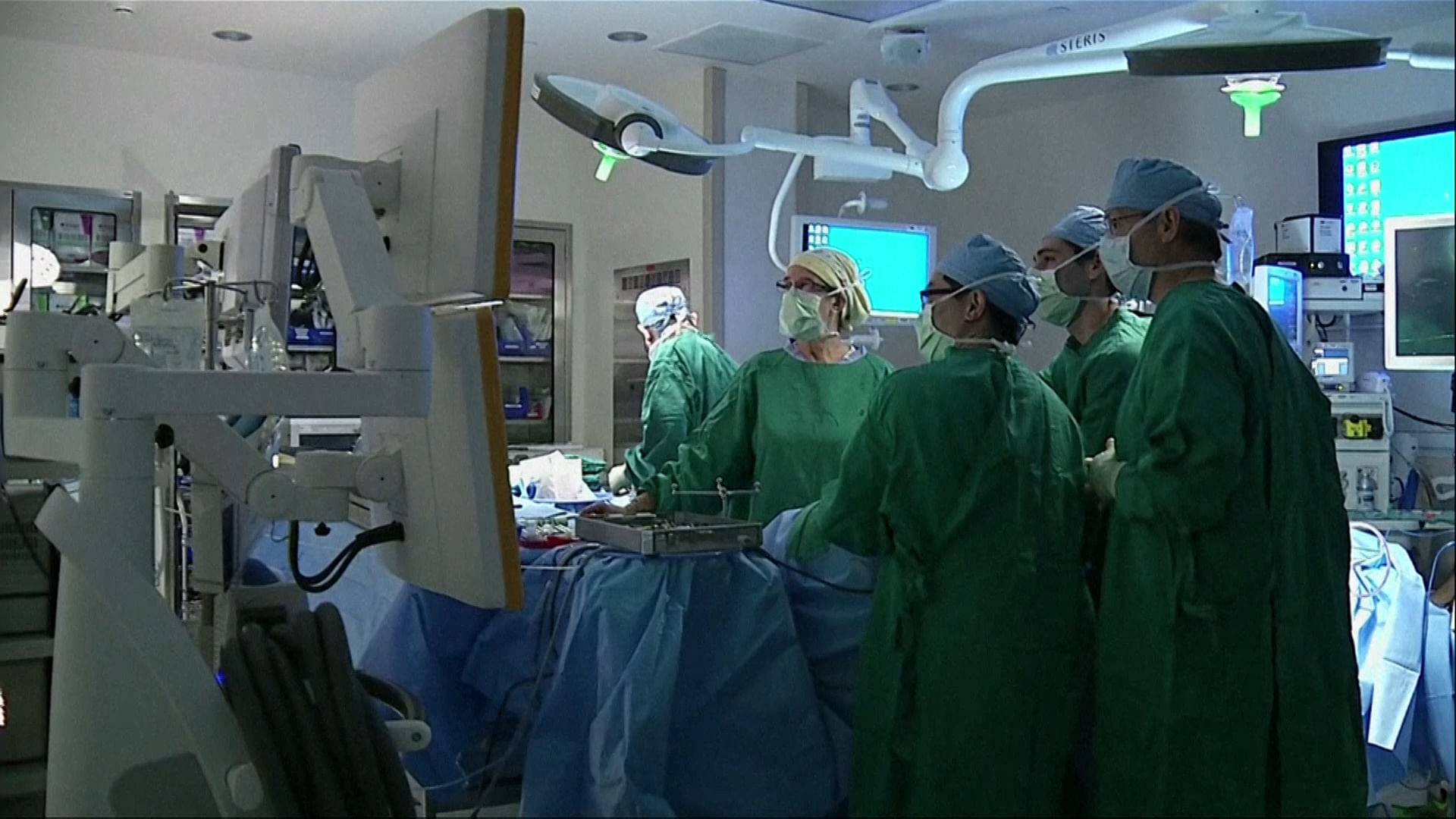 Doctor’s performing the surgery. (Photo: AP screengrab)