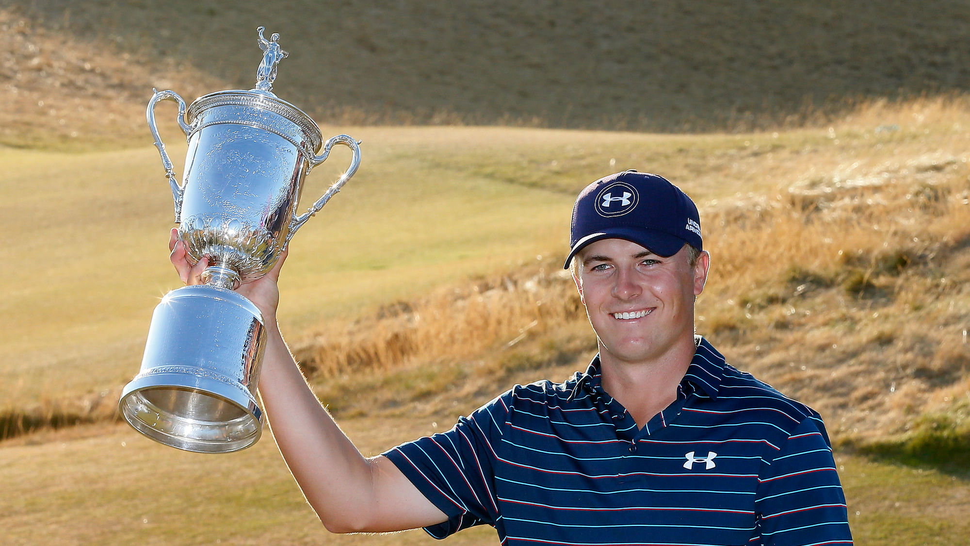 Jordan Spieth poses with the US Open trophy after his victory on Sunday. (Photo: AP)
