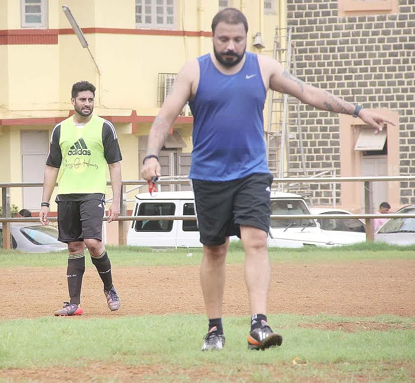 Abhishek Bachchan and Bunty Walia playing football (Photo: Yogen Shah)