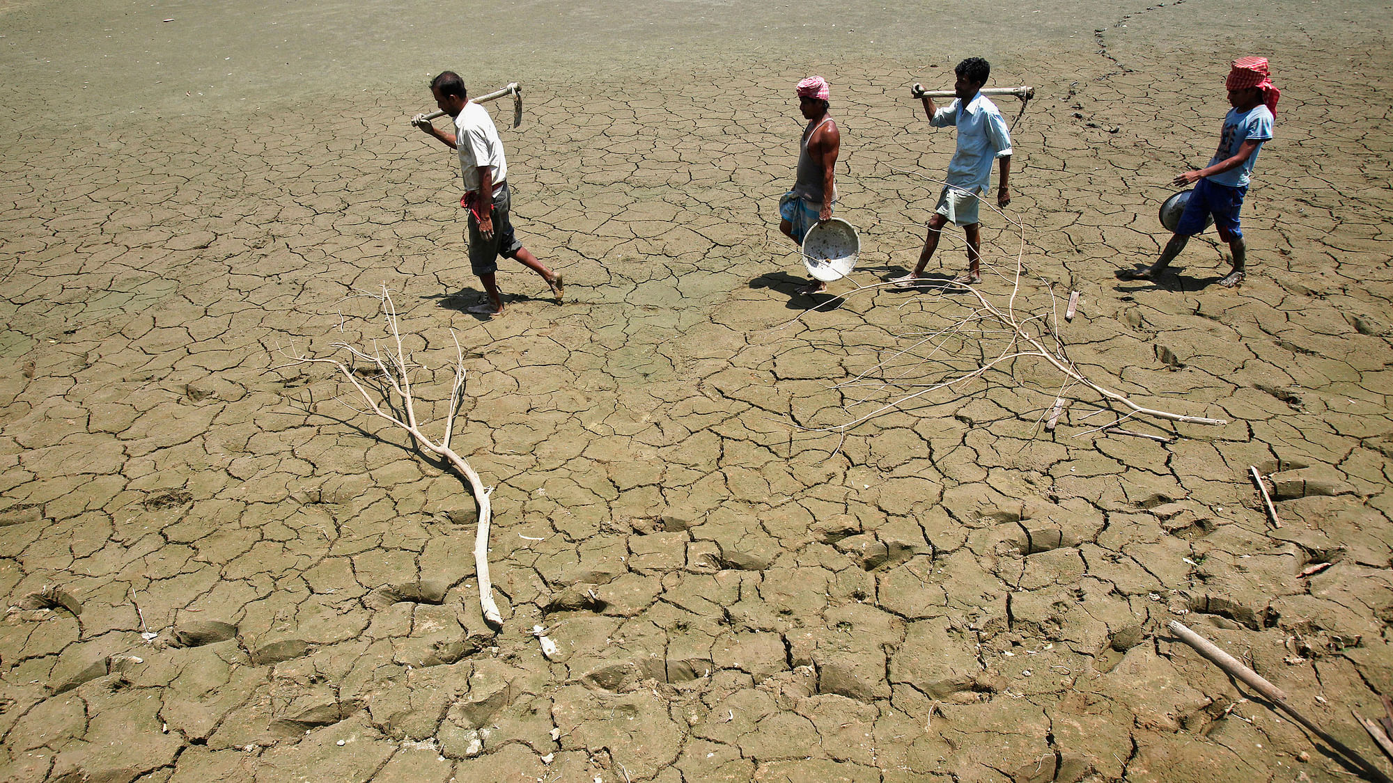 Parched soil of a dried lake. (Photo: Reuters)