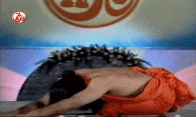 Warm up yoga in Ramdev style (Source: <a href="https://www.youtube.com/watch?v=oYWJGdZG-wg">YouTube/babaramdev</a>)